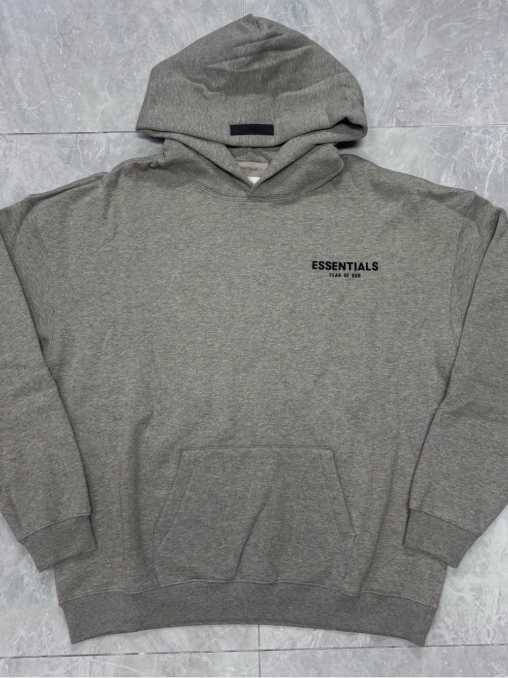 Essentials Gray Pullover Hoodie with Subtle Chest Logo